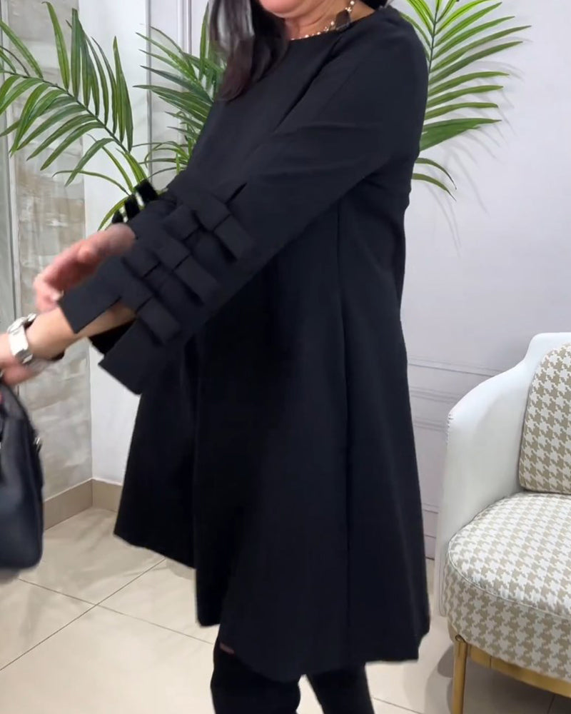 Casualowa sukienka do kolan z długim rękawem